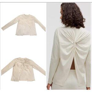 Lululemon Twist back relaxed fit long sleeve‎ in color Bone no tag Size XS